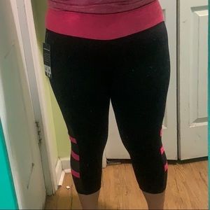 Hot pink and black high-waisted capri leggings